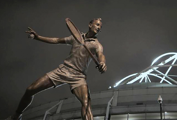 Rod Laver sculpture at night